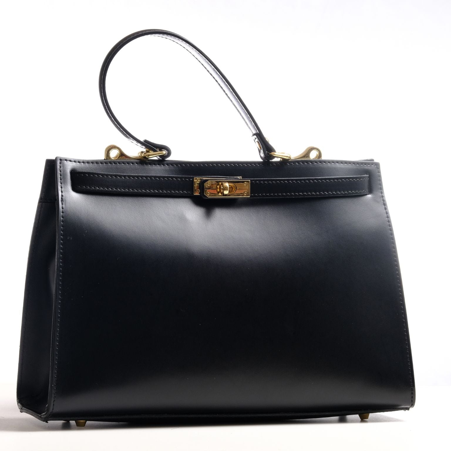 borsa in pelle liscia nera capiente con chiusura a torsione